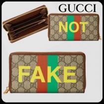 グッチ 財布  GGスプリーム FAKE/NOT 偽物ラウンドジップ 6361692GCAG82...