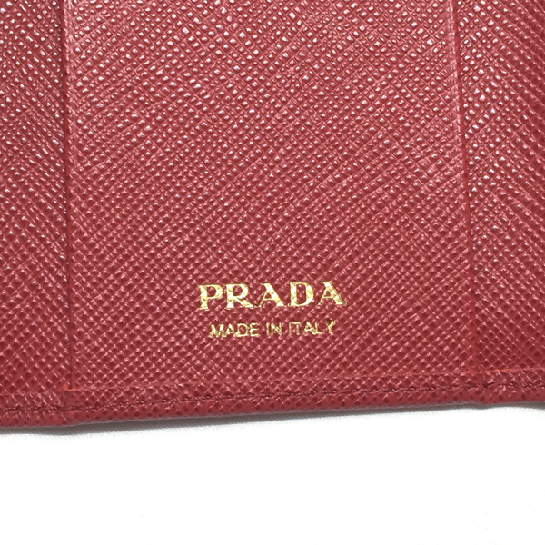 PRADA プラダキーケース コピー1PG222 SAFFIANO FIOCCO FUOCO リボンモチーフ 6連キーケース 1PG222 ZTM F068Z