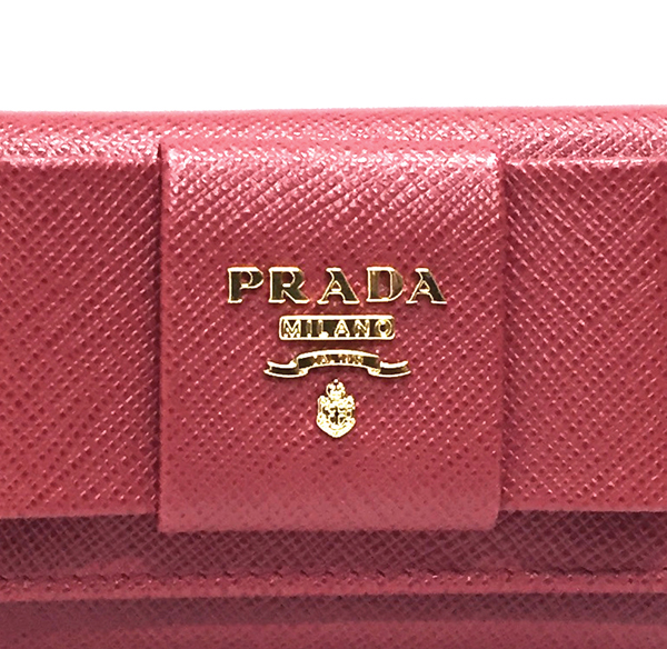 PRADA プラダキーケース コピー1PG222 SAFFIANO FIOCCO FUOCO リボンモチーフ 6連キーケース 1PG222 ZTM F068Z